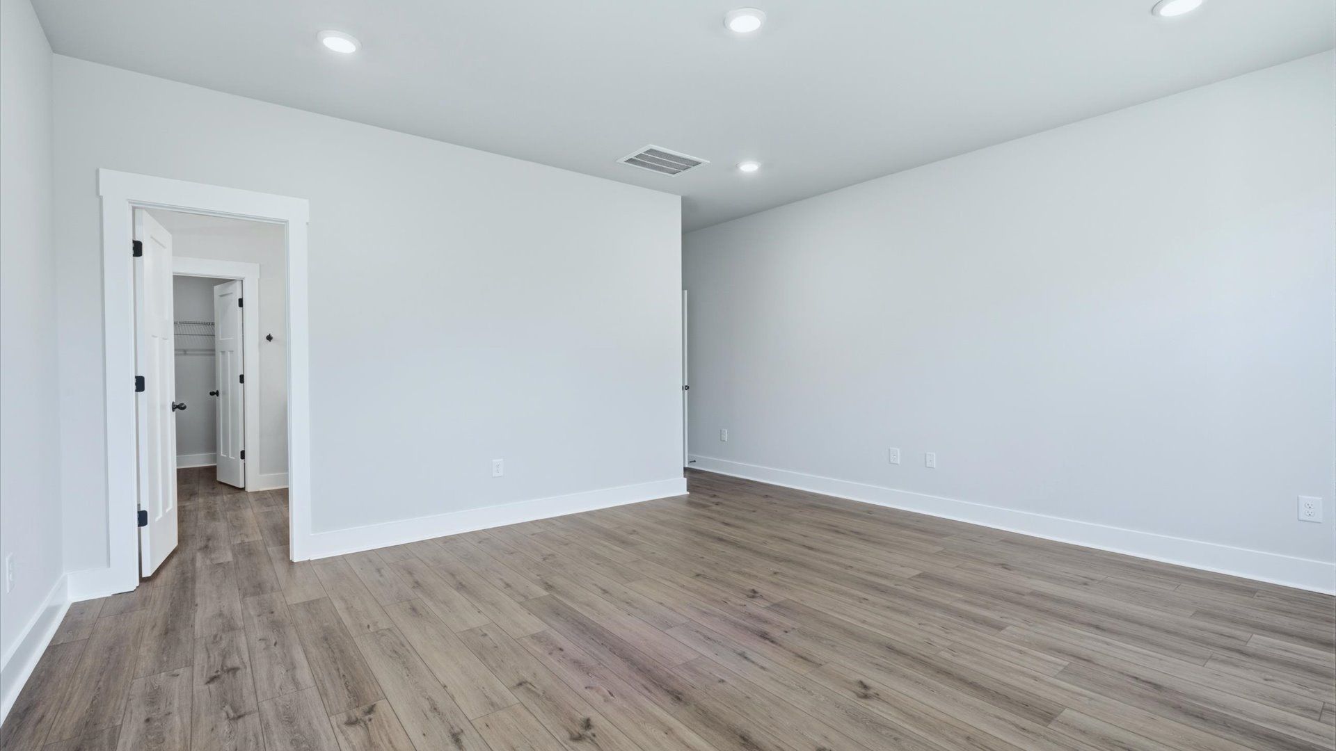 Eye-catching details and elegant finishes in the vibrant primary suite of this select home near Lake Hartwell
