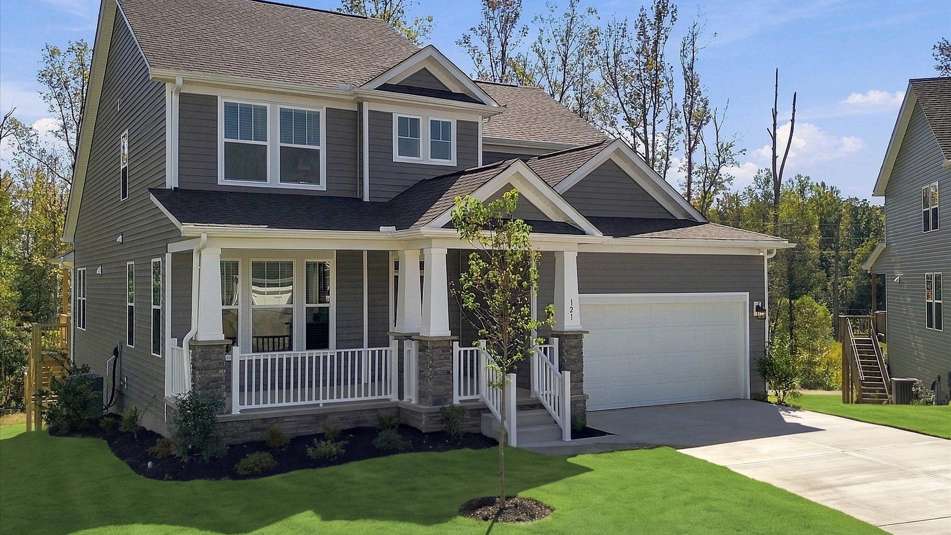 Refined exterior design with balanced architectural detail in this distinguished two-story home at Livingston Park