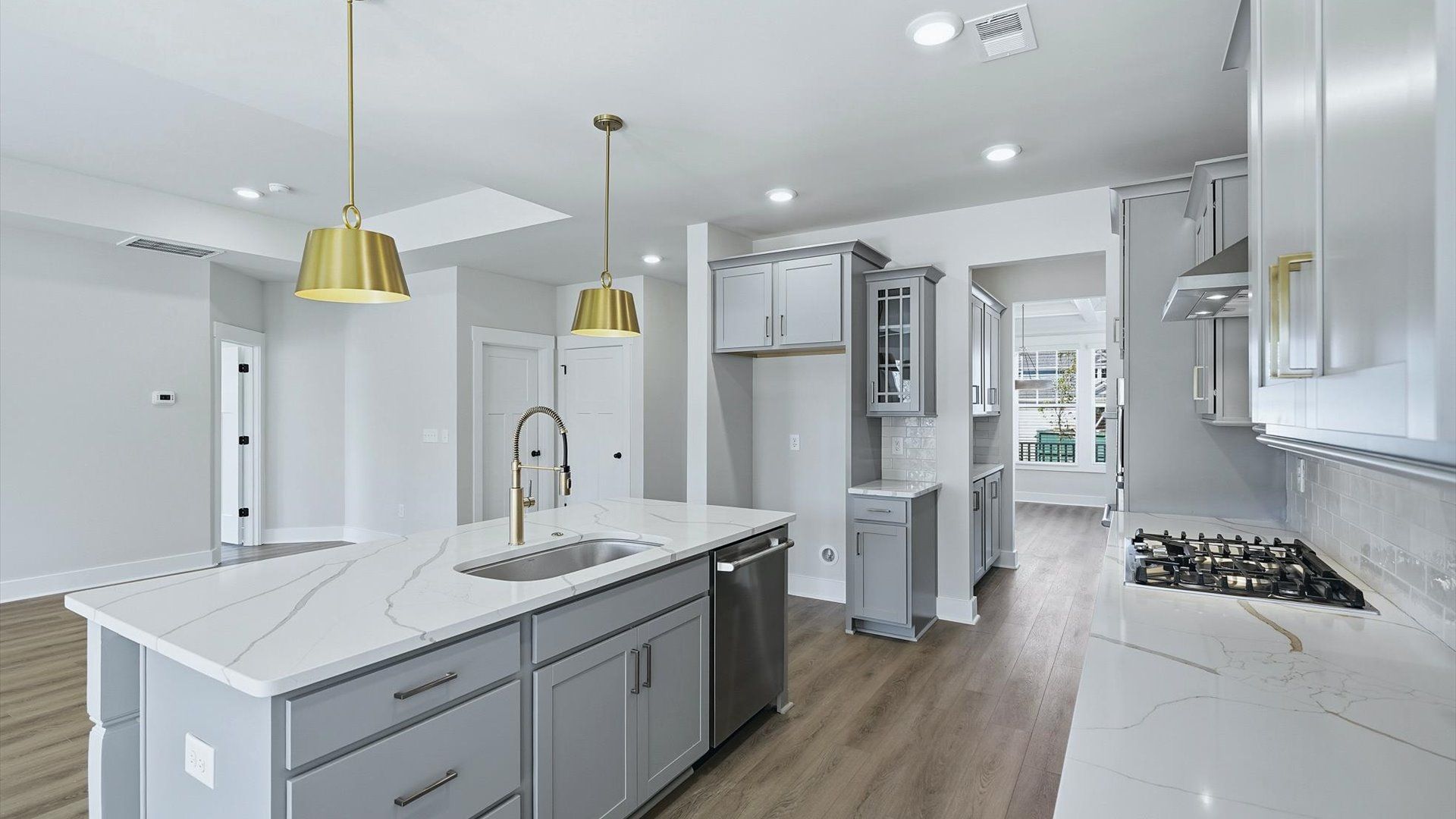 Contemporary kitchen featuring premium countertops and streamlined cabinetry near Downtown Greenville