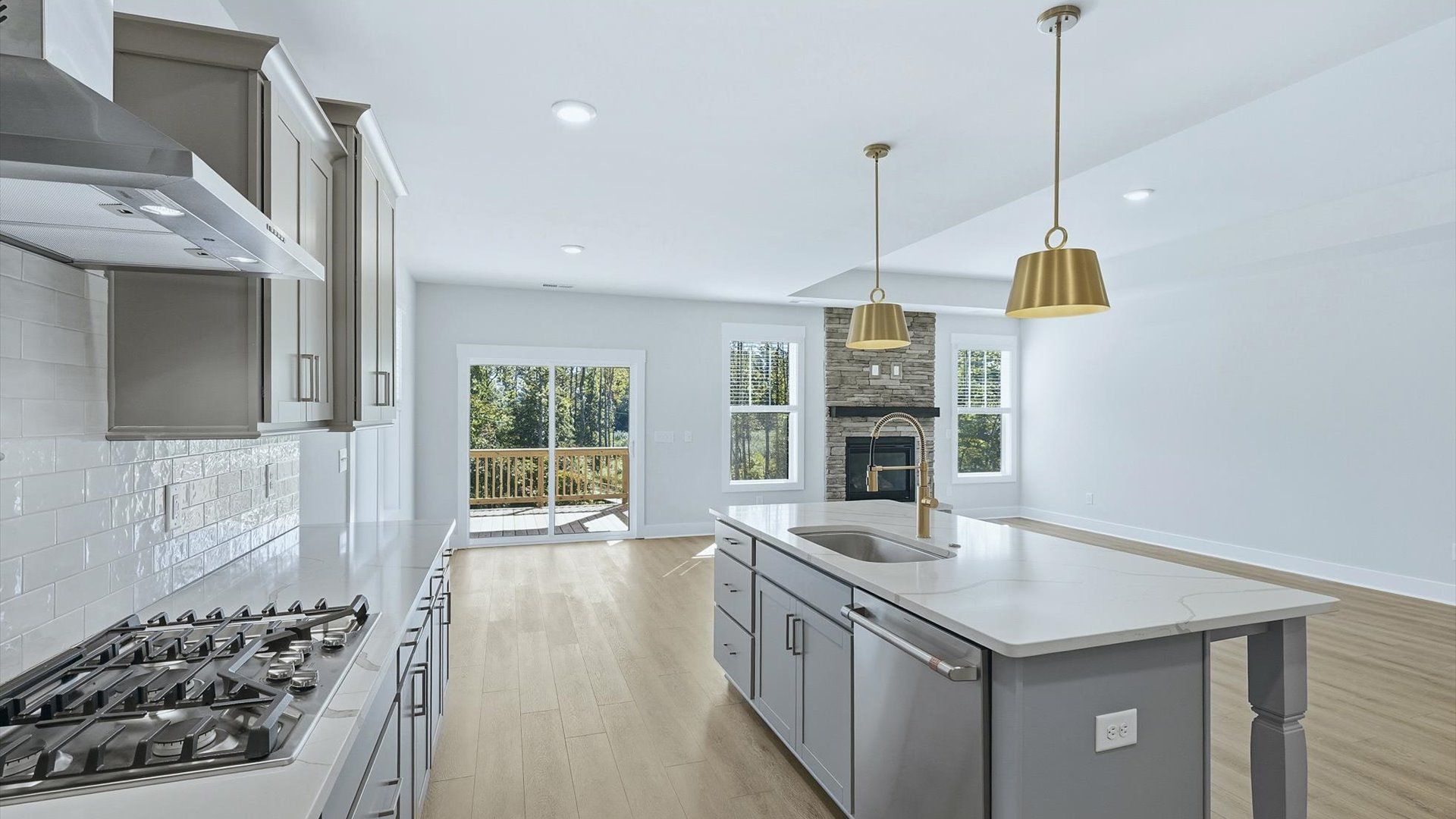 Accomplished design in a kitchen that blends function and form with a right-sized island at The Reserve at Livingston Park