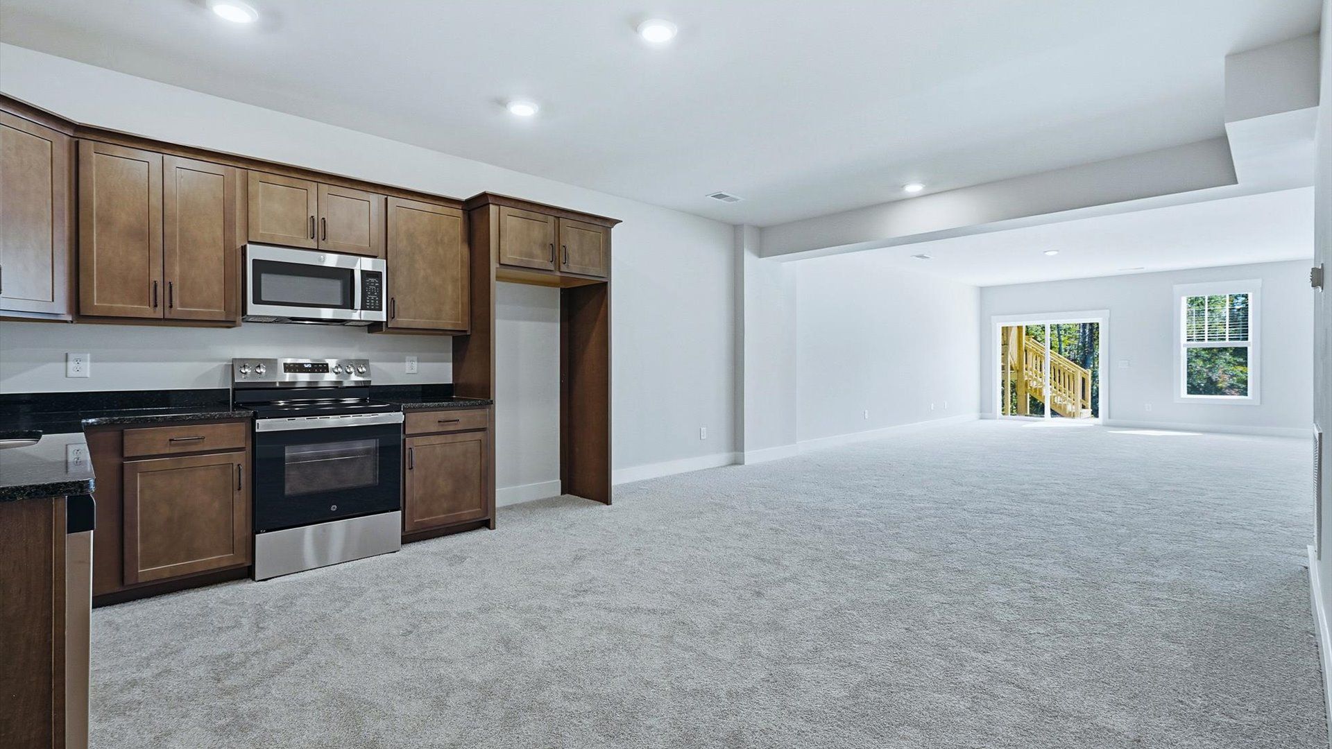 Finished basement designed for entertaining, complete with a convenient kitchen and generous living space