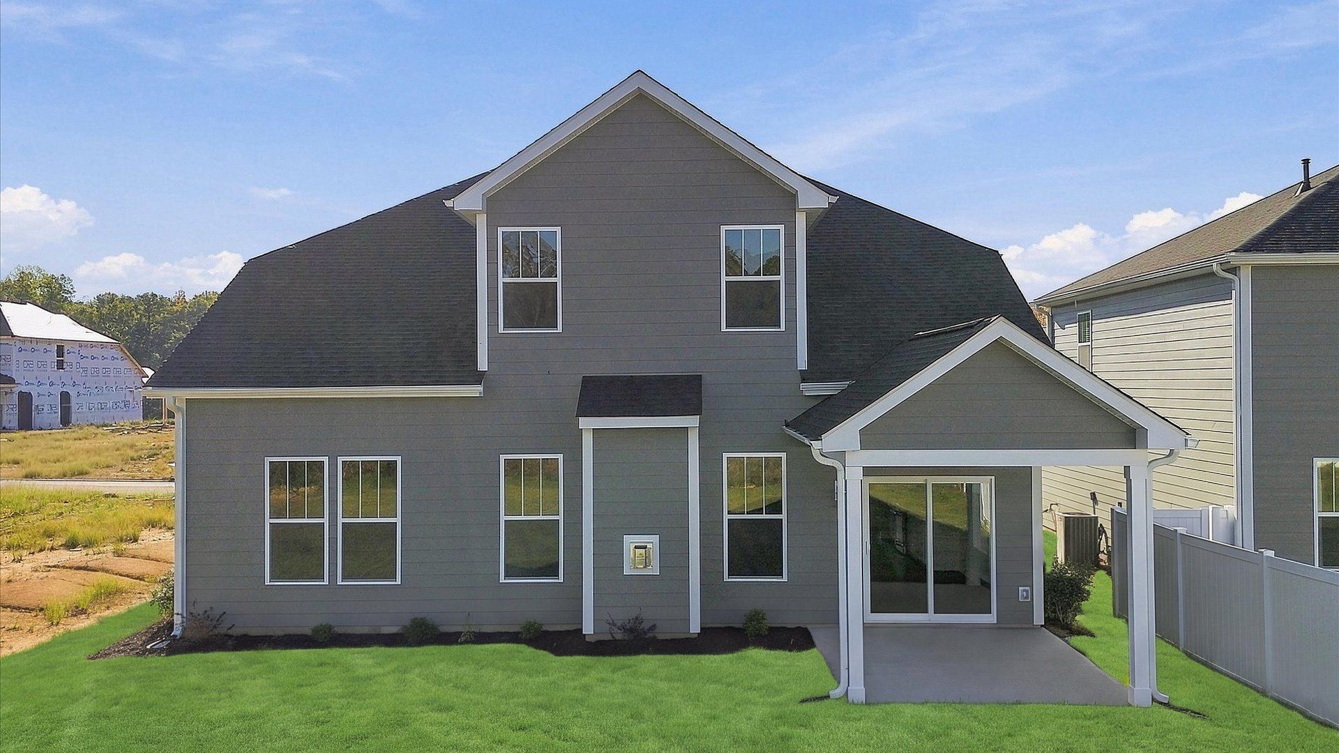 Established charm meets functional outdoor living with a spacious rear covered porch at Mulberry Estates