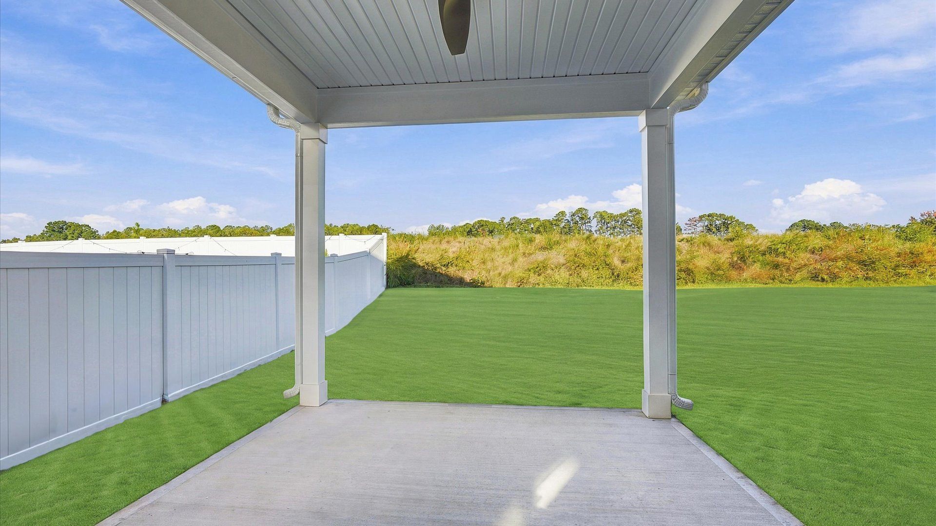 Exclusive rear covered porch with accomplished detail and elevated outdoor living potential by DRB Homes