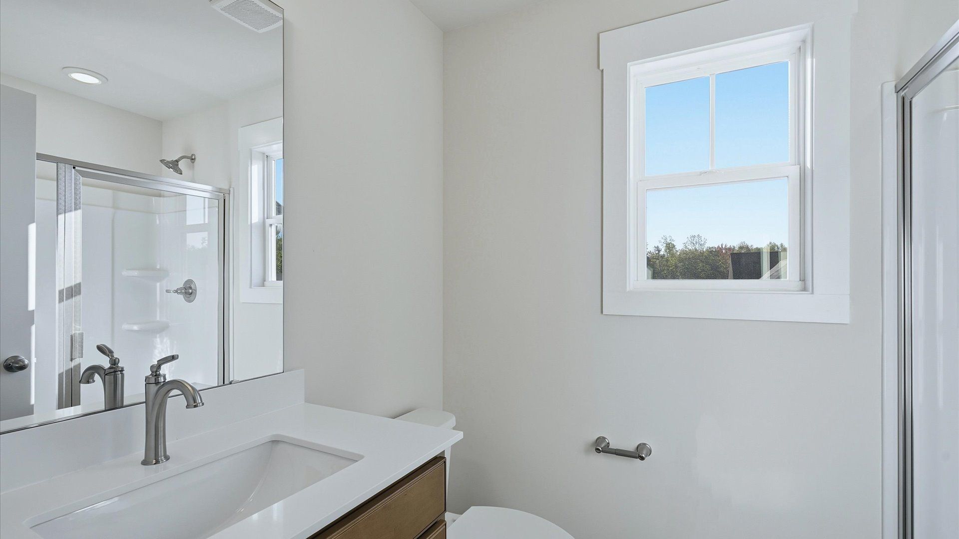 Top-notch bathroom with current fixtures, tasteful materials, and elevated charm near Downtown Simpsonville