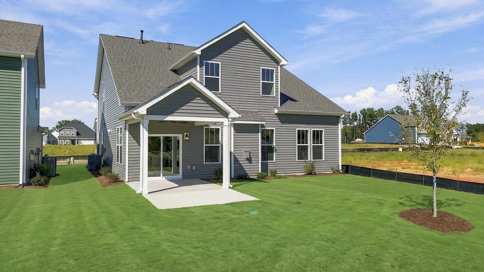 Established charm meets functional outdoor living with a spacious rear covered porch near Lake Bowen