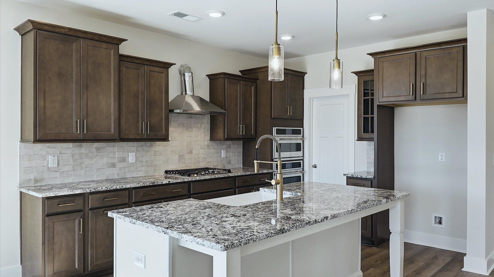 Beautifully appointed kitchen with spacious counters and sophisticated detailing in Inman, SC