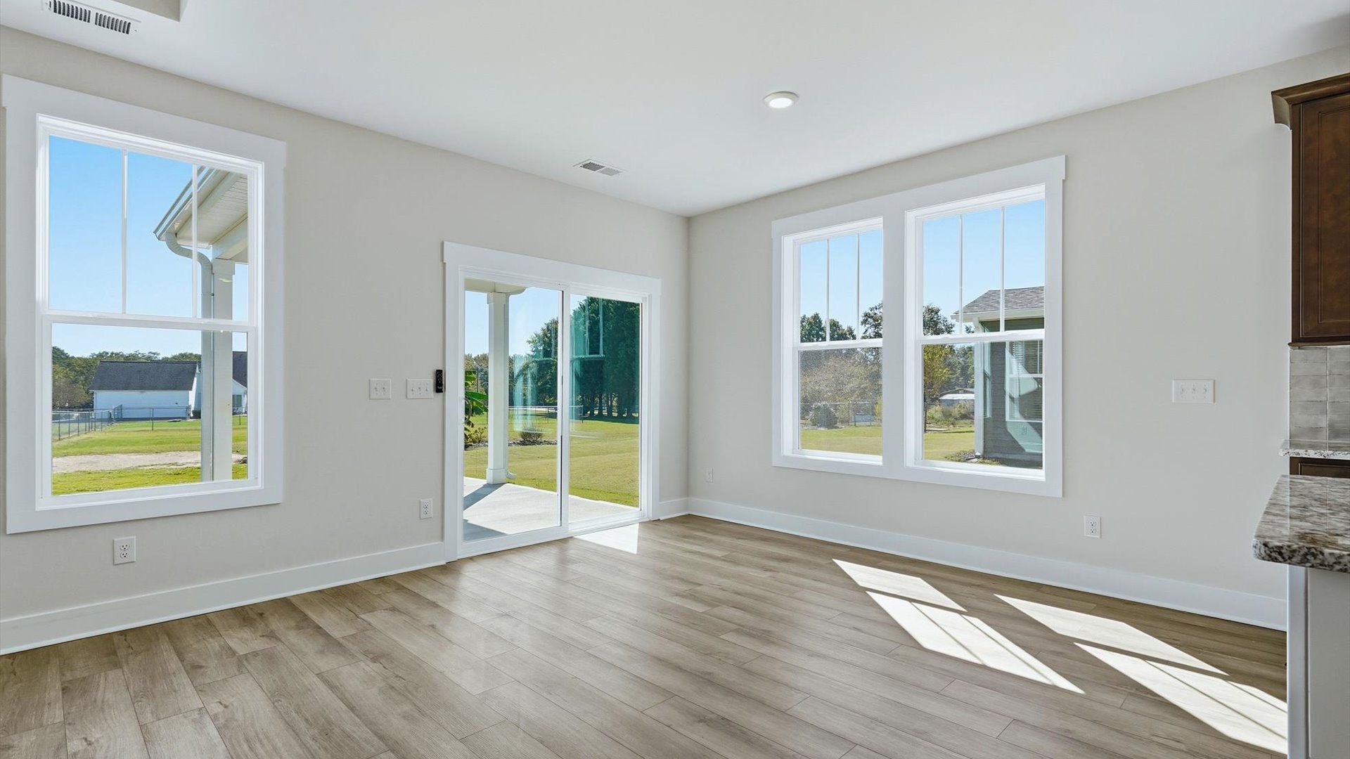 Inviting breakfast area with a seamless connection to the kitchen for everyday living at Walnut Ridge