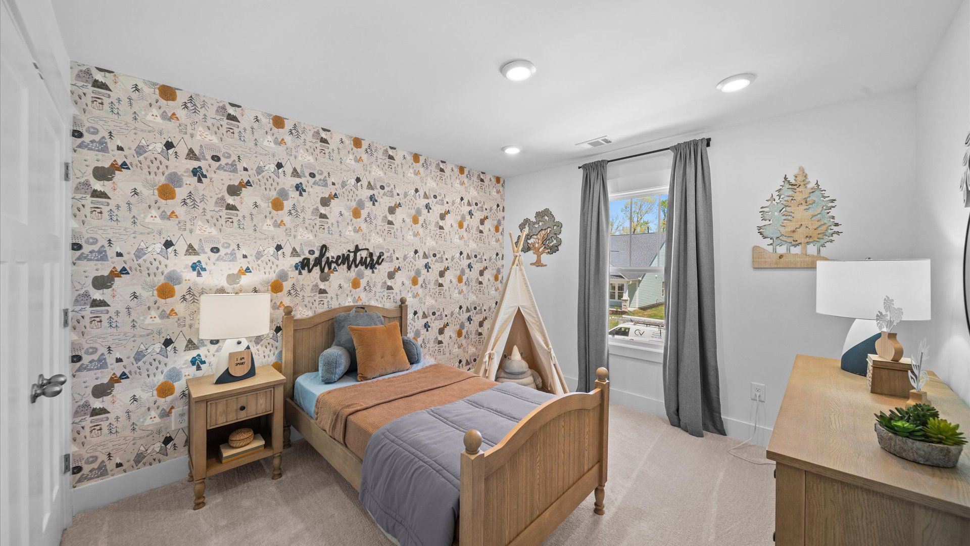 Bright and serene bedroom with comfortable carpeted flooring and a large window for vibrant light near Downtown Greer