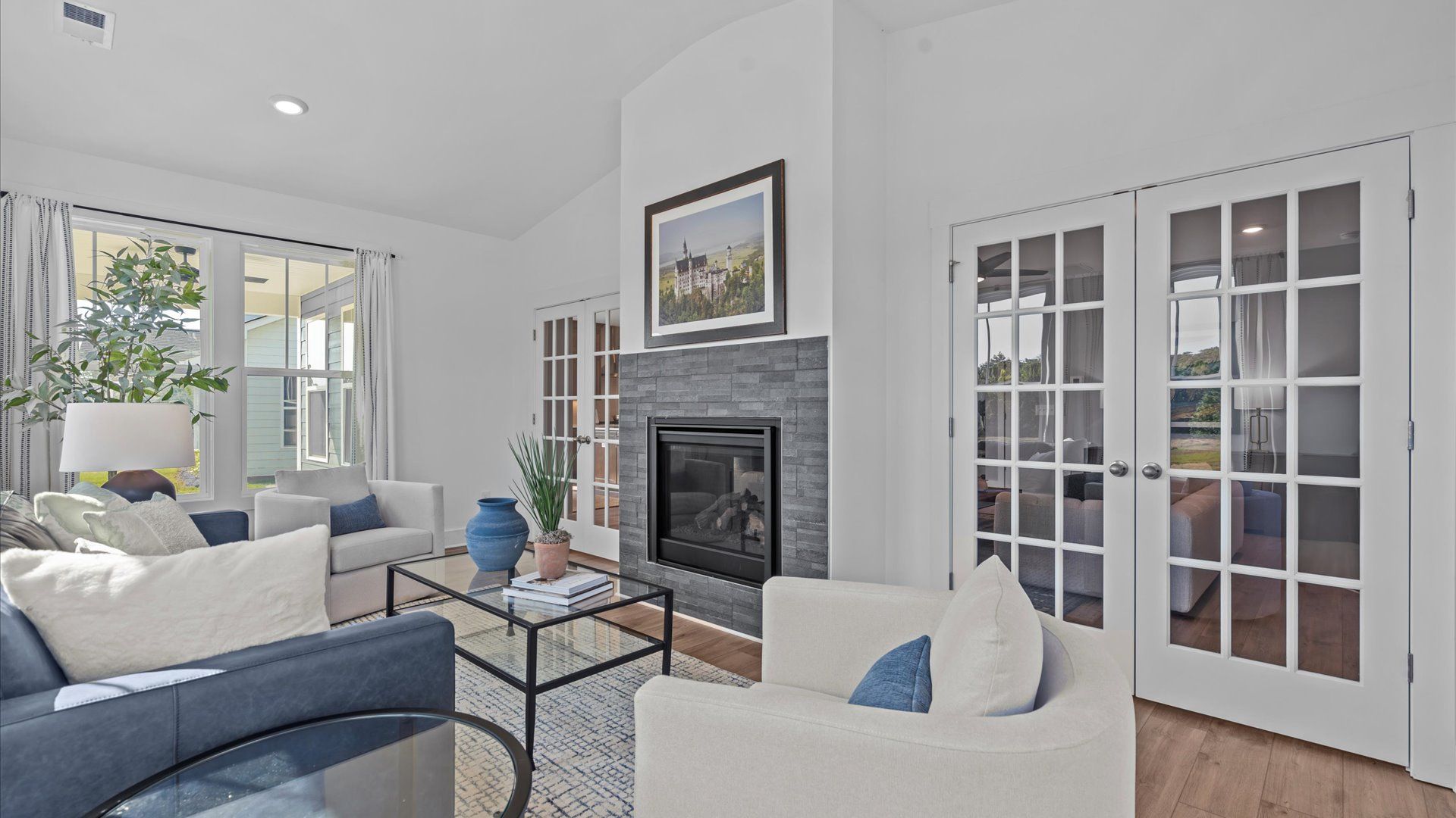 The electric fireplace brings warmth and character to this thoughtfully designed morning room in SC