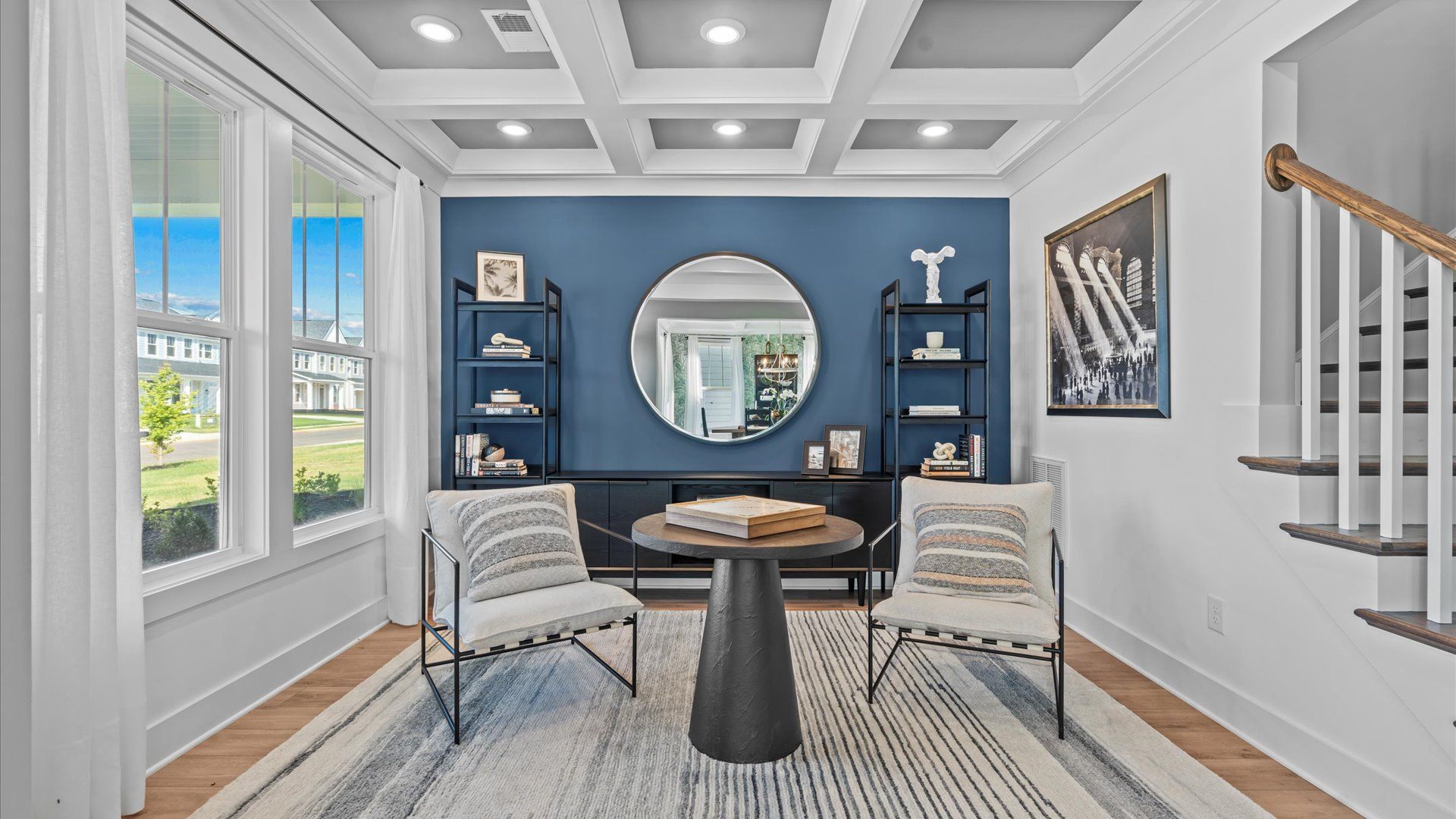 Impressive gathering space featuring elevated finishes and timeless appeal by DRB Homes