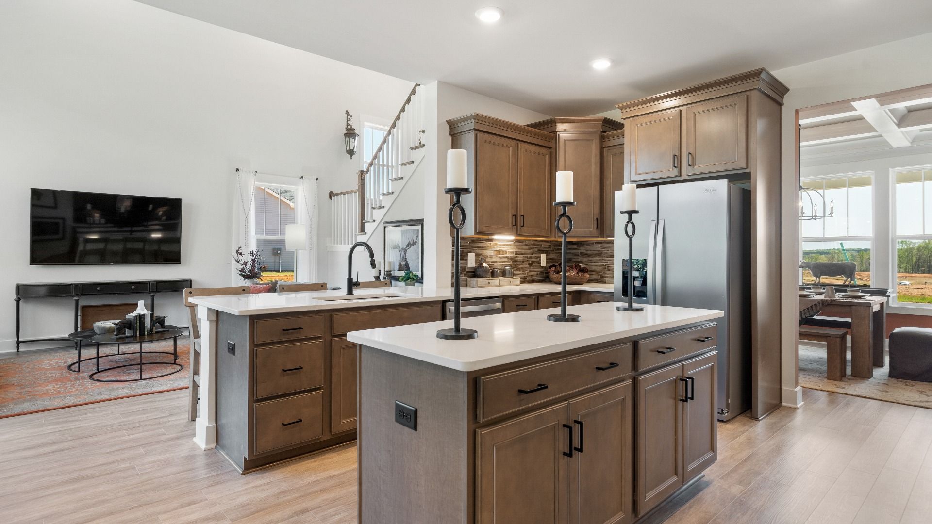 Elegant Sutherland Design kitchen designed for convenience, connection, and everyday living at the Pinebrook community