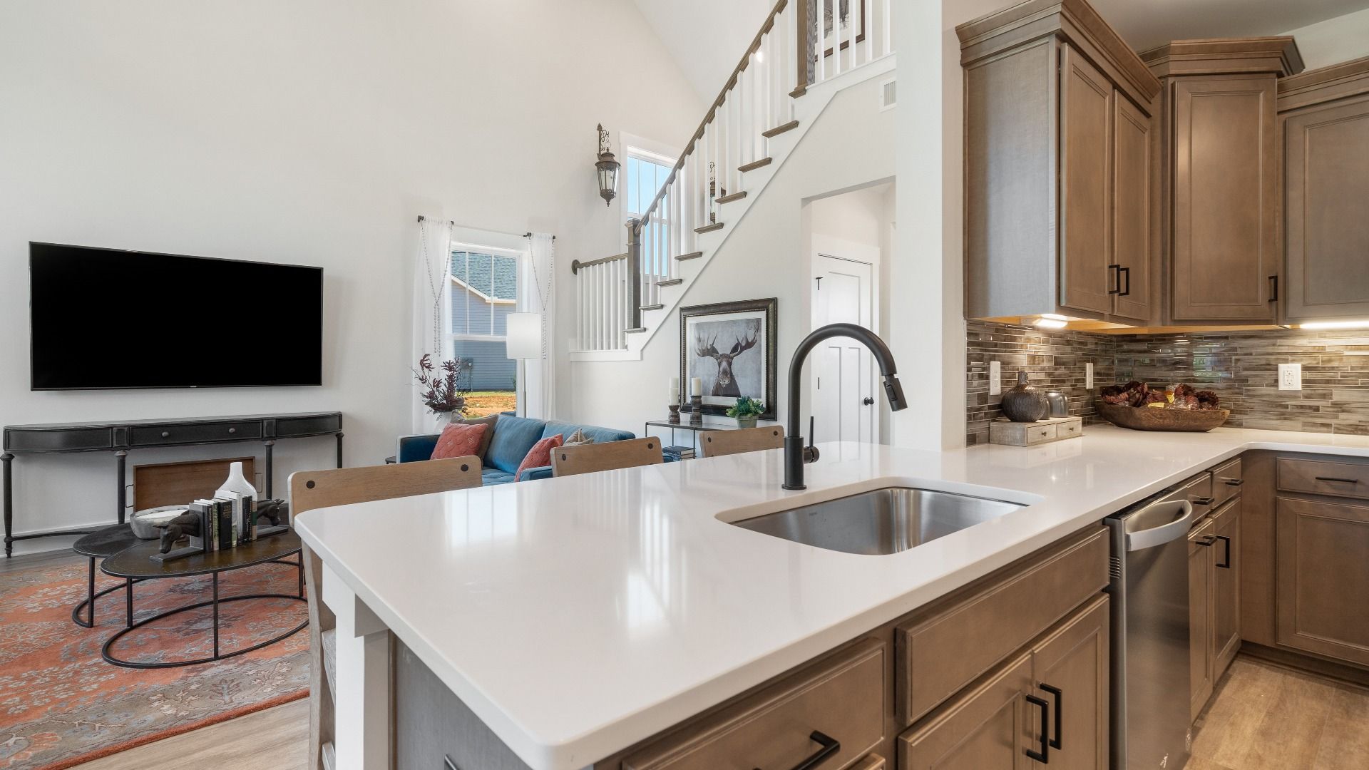 Modern kitchen design with clean lines, premium surfaces, and open sightlines located in Woodruff, SC