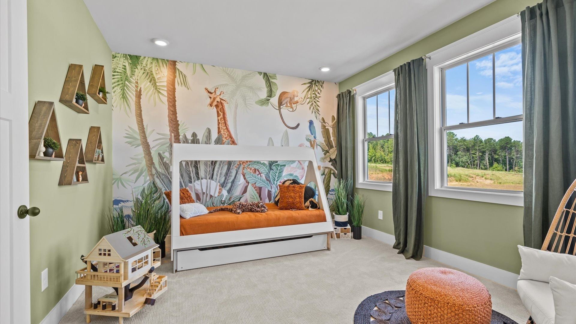 Superior comfort in this light-filled bedroom with plush carpeting and thoughtfully placed large windows