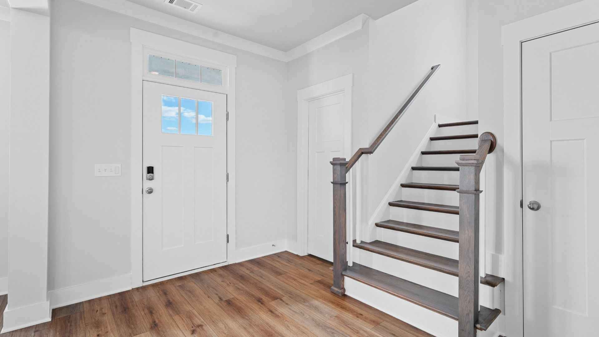 2 story single family home, all white with an open concept design