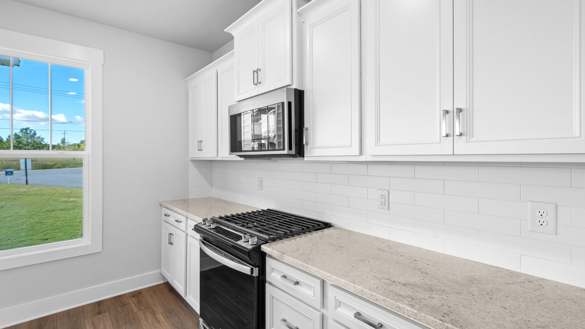 2 story single family home, all white, kitchen