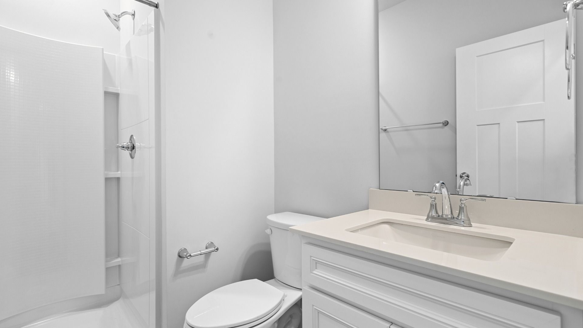 2 story single family home, all white, bathroom