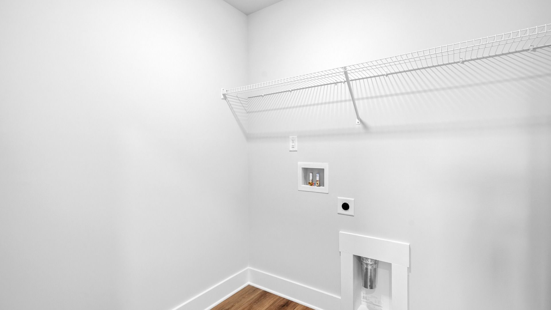 2 story single family home, all white, laundry room