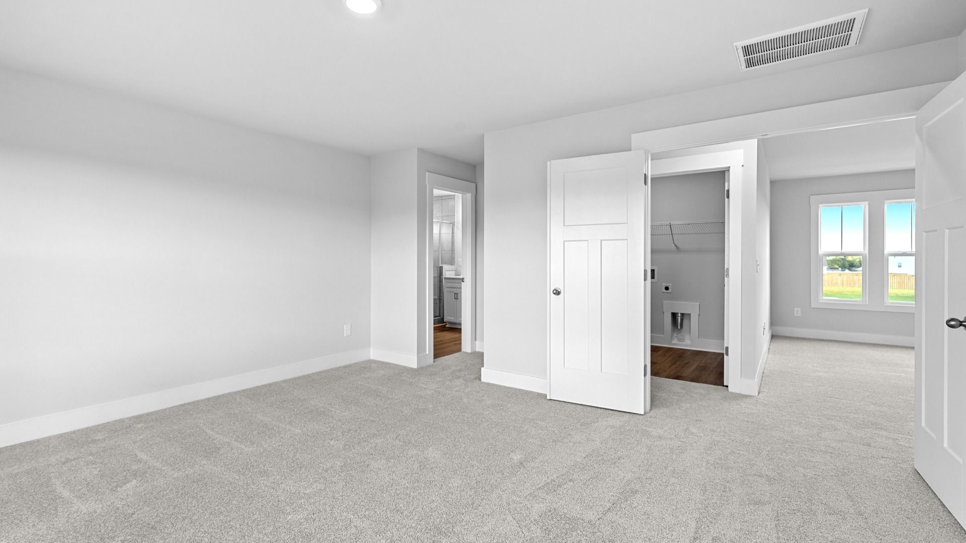 2 story single family home, all white, owner's suite