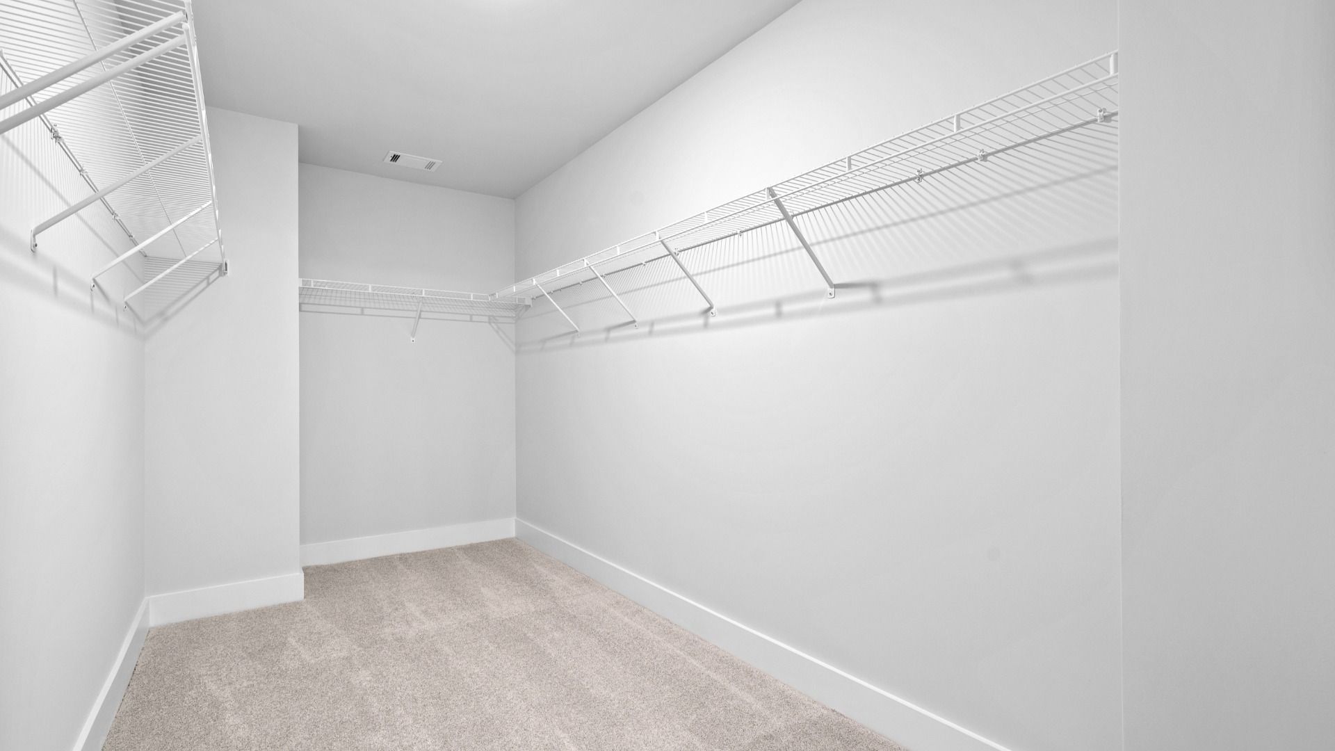 2 story single family home, all white, owner's closet