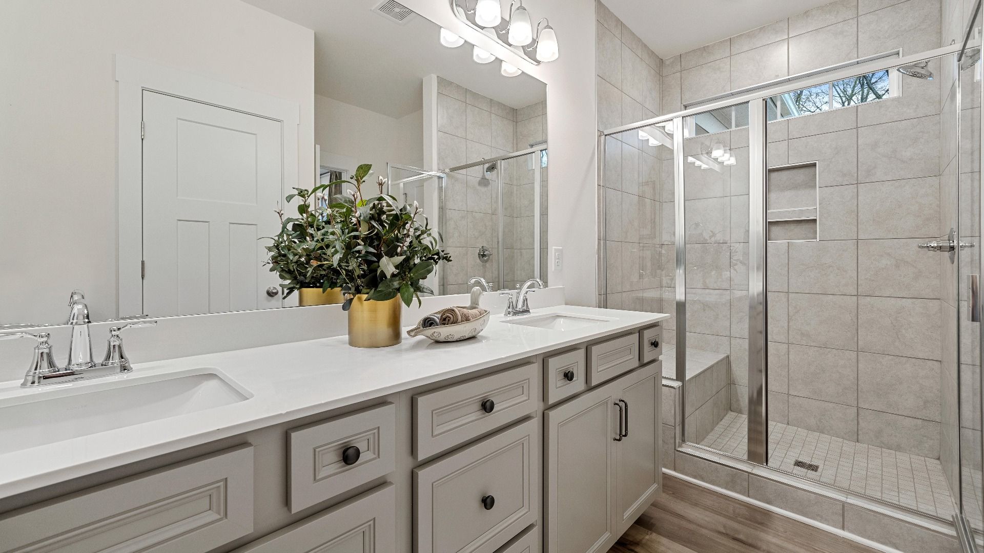 Primary Bathroom of The Oakleigh Design by DRB Homes
