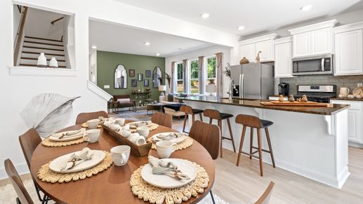 New two story townhome at Tyger Ridge in Spartanburg, SC with cozy breakfast area with wooden table