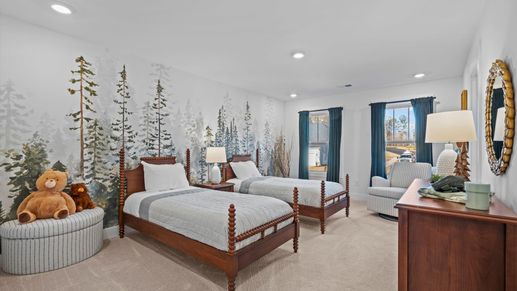 Plush carpeted secondary bedroom at Mulberry Estates by DRB Homes in Simpsonville, South Carolina