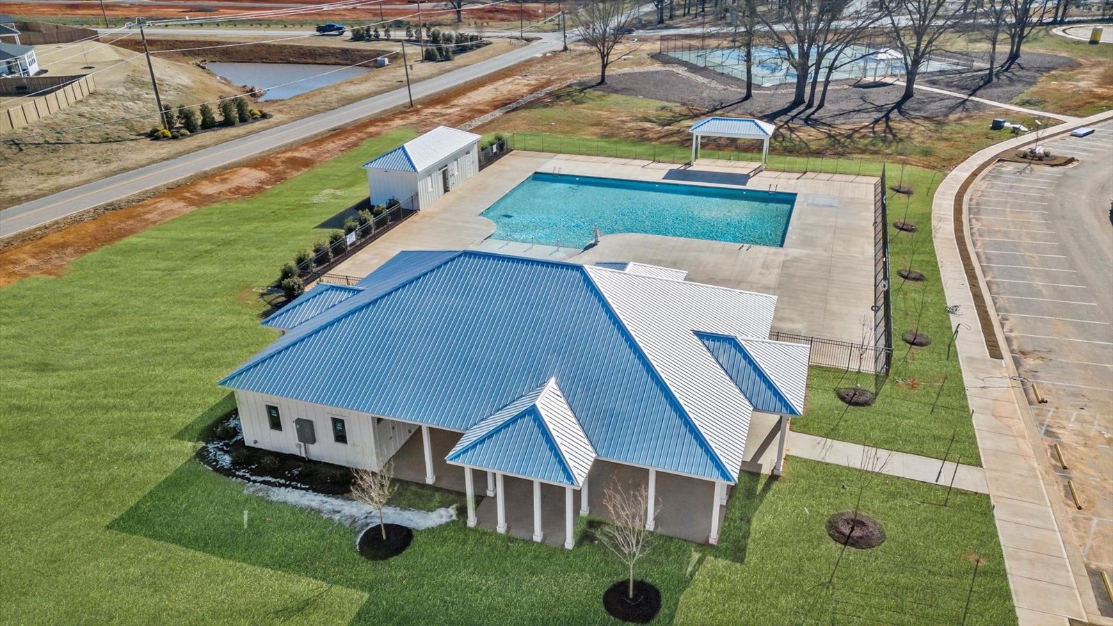 Amenities center with large pool at Village at Midway by DRB Homes in Anderson, SC