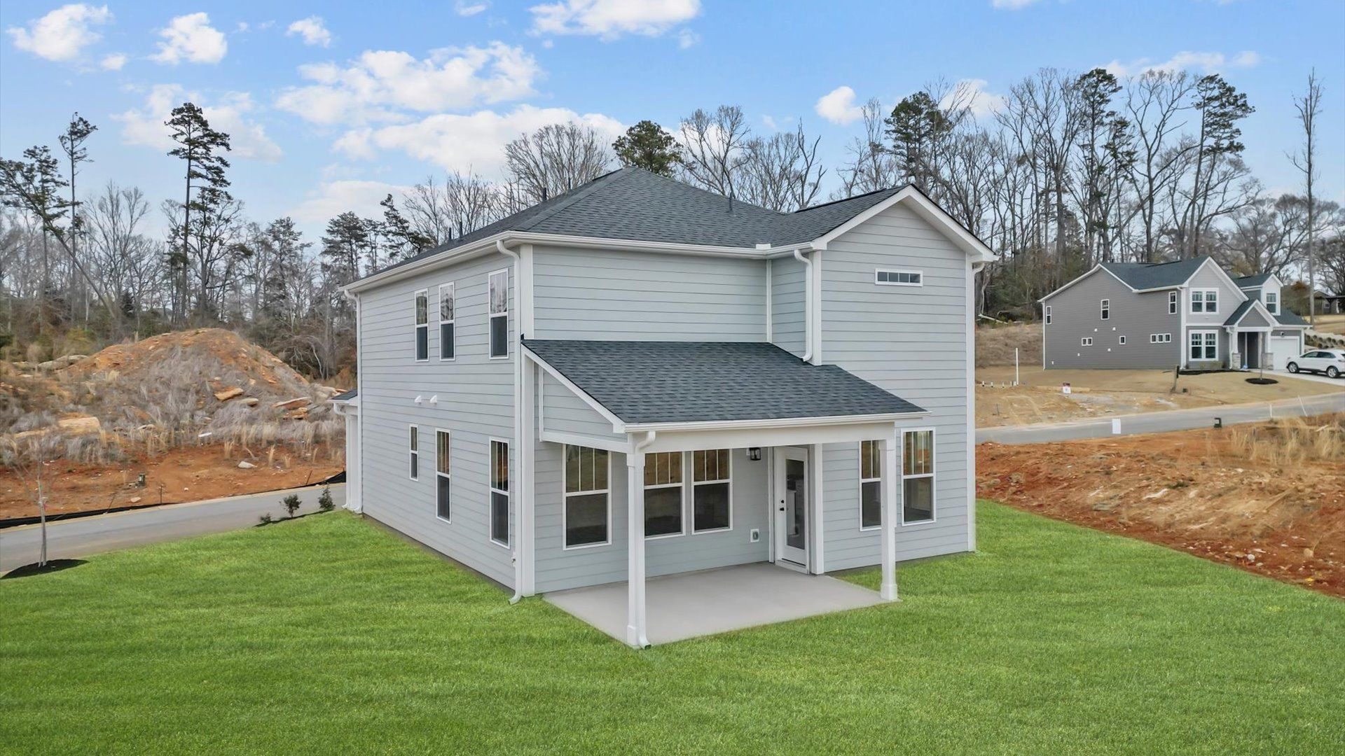 Spacious covered back porch with direct access to large backyard at Pleasant Falls in Moore, SC