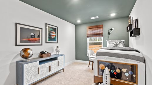 Plush carpeted secondary bedroom in two story townhome at Saluda Crossing by DRB Homes in Piedmont, SC