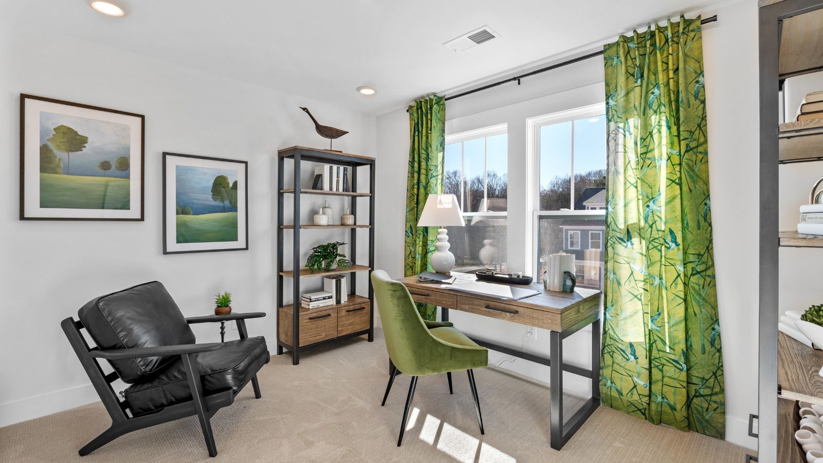 Natural themed, green accented office space with cozy carpeted flooring and large windows at Fox Hollow by DRB Homes