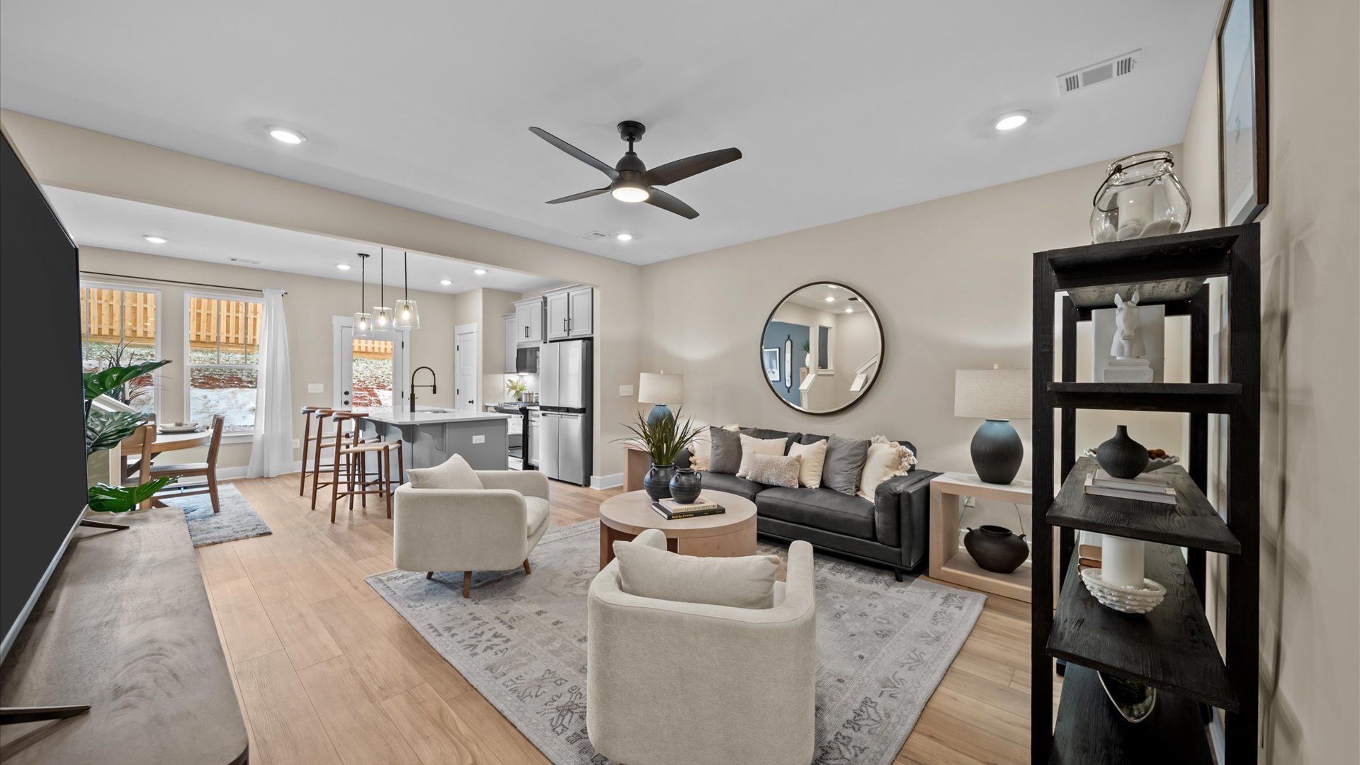 Spacious family room with accomplished design and eye-catching details throughout