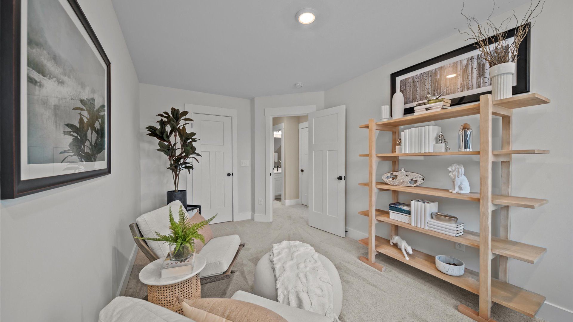 Vibrant and inviting secondary bedroom featuring a walk-in closet and refined finishes
