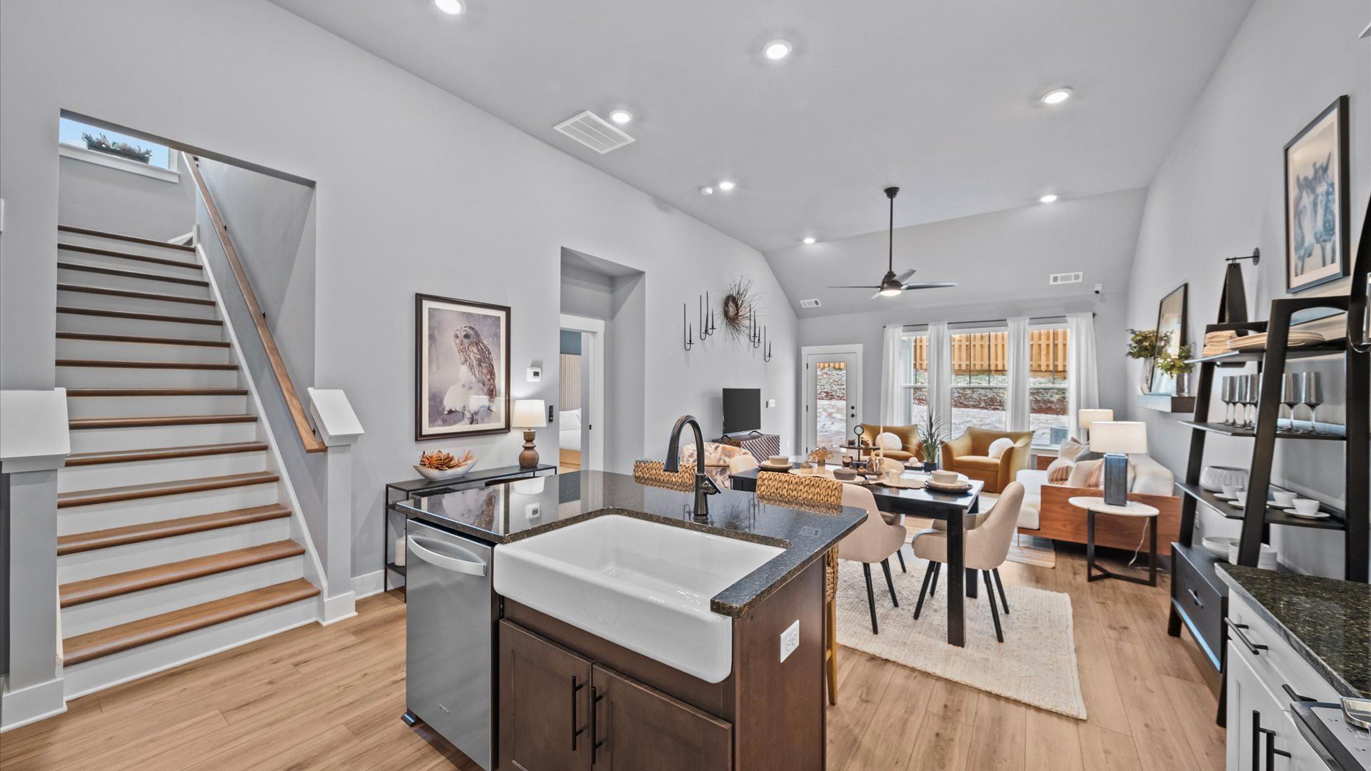 Two-story ceilings and superior scale define this elegant, light-filled family room