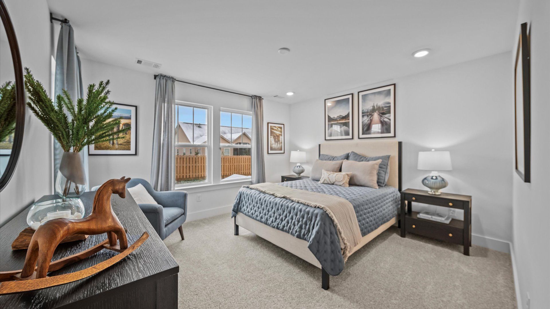 Highly functional bedroom with walk-in closet and tasteful carpet for a restful retreat