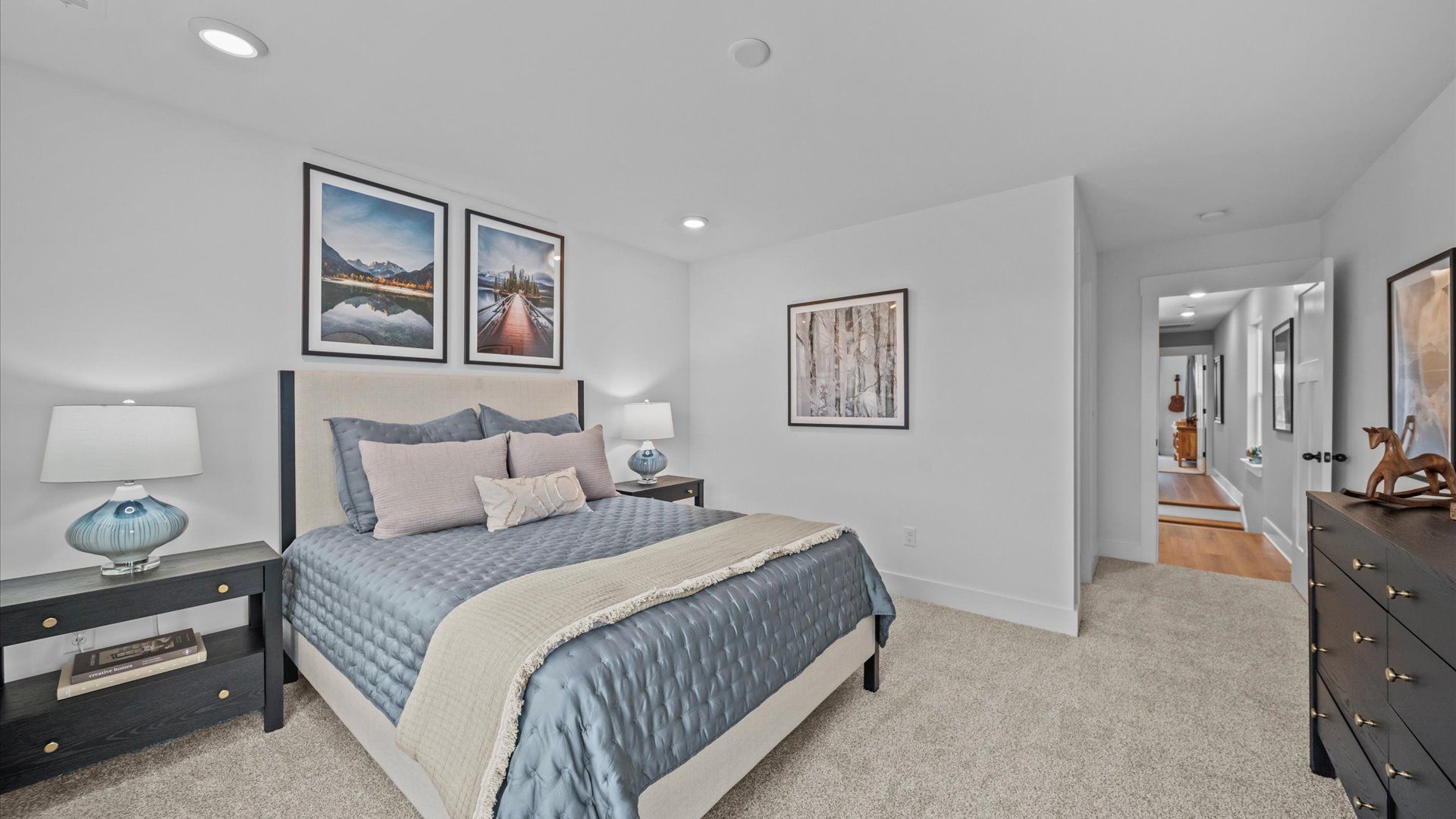 Vibrant and inviting secondary bedroom featuring a walk-in closet and refined finishes