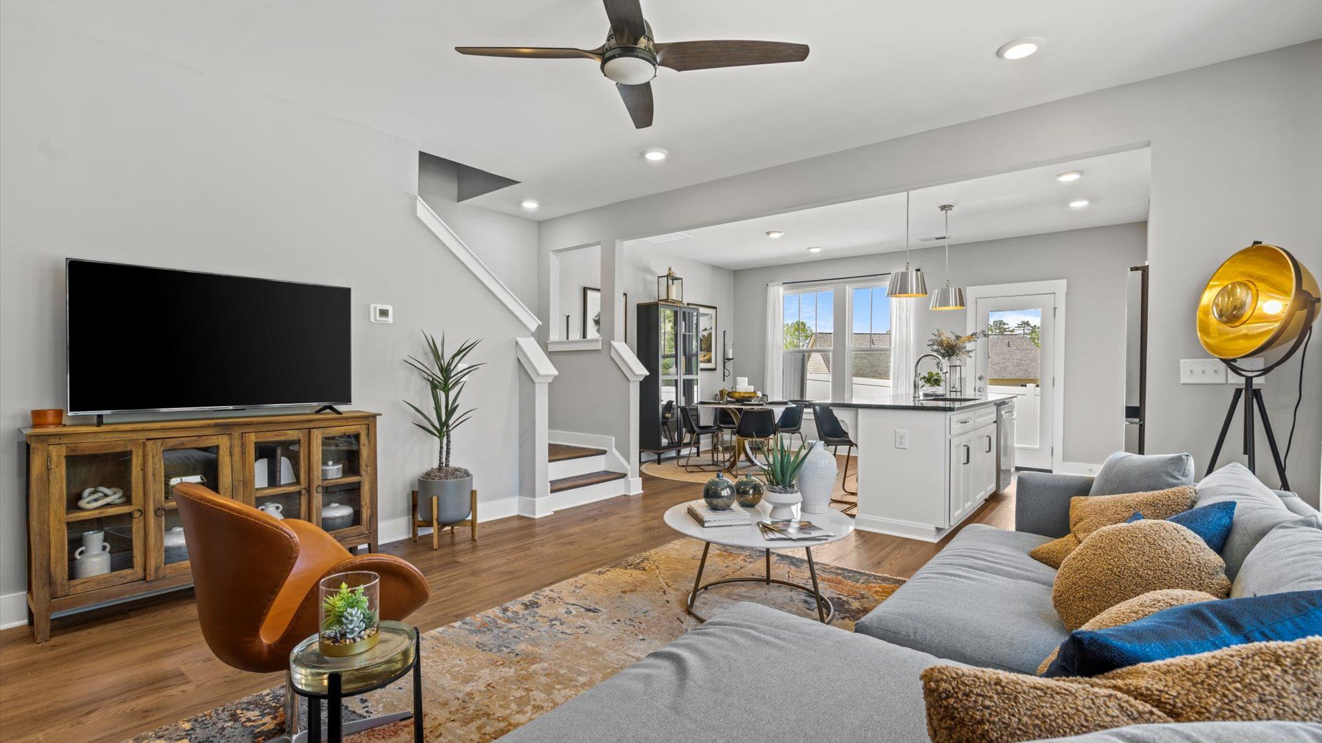 Downtown Greenville, SC two story townhome with modern family room with large windows & hardwood flooring at Hickory Heights