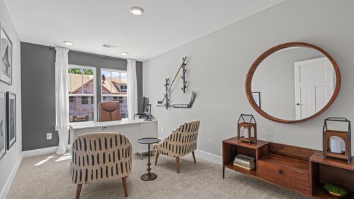Secondary bedroom with large windows at Hickory Heights by DRB Homes near Downtown Greenville, SC