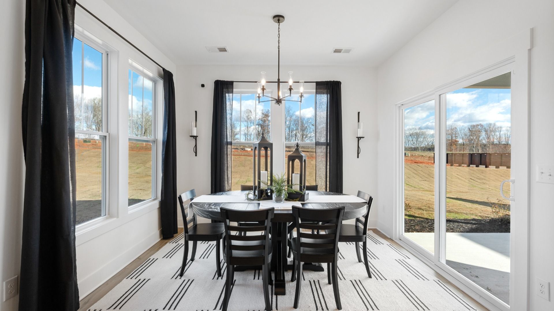 Optional extended breakfast room with multiple large windows and outdoor access in Drayton floorplan at Fox Hollow