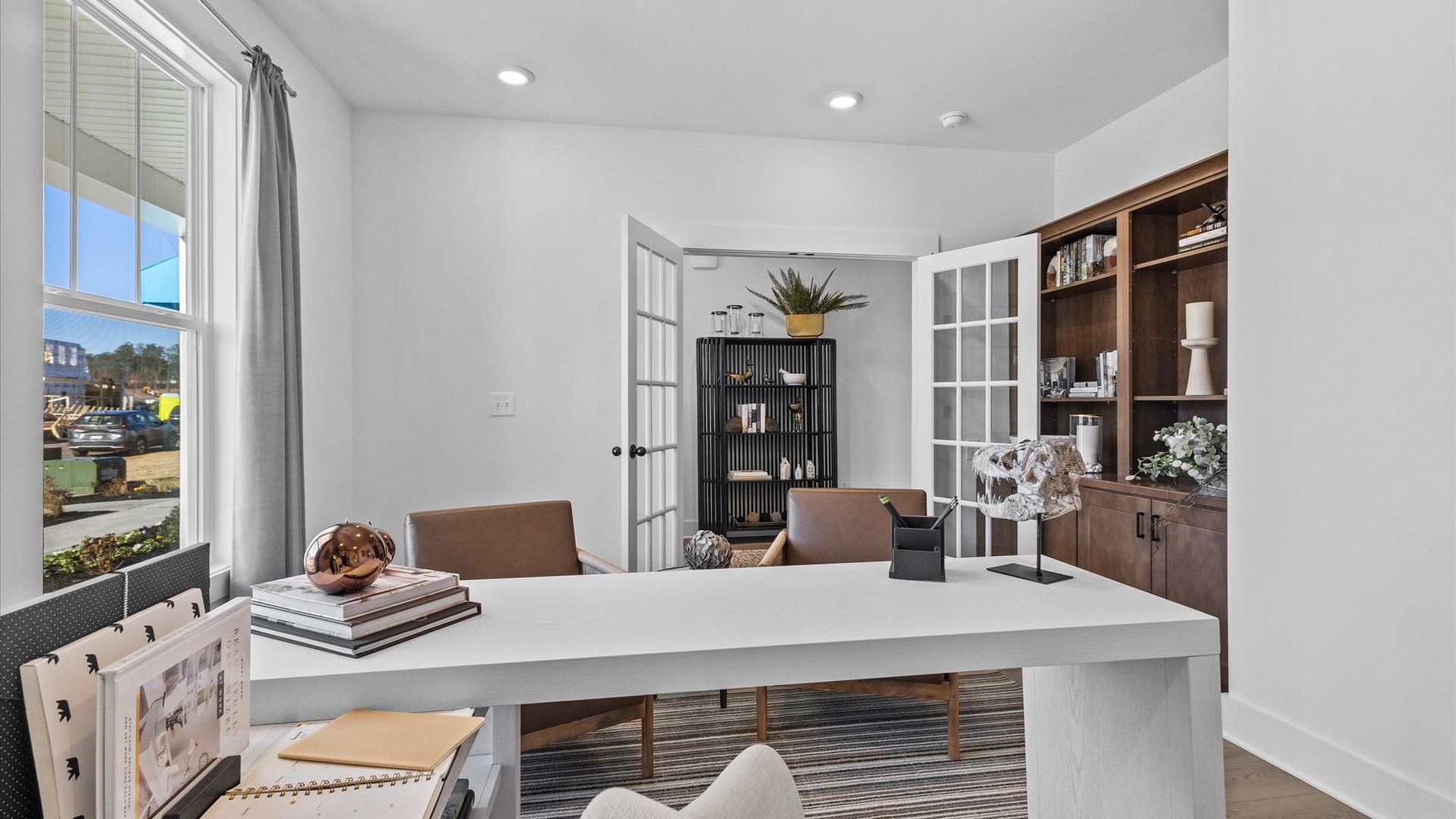 French door access study space with large window at Wells Crossing by DRB Homes in Seneca, SC