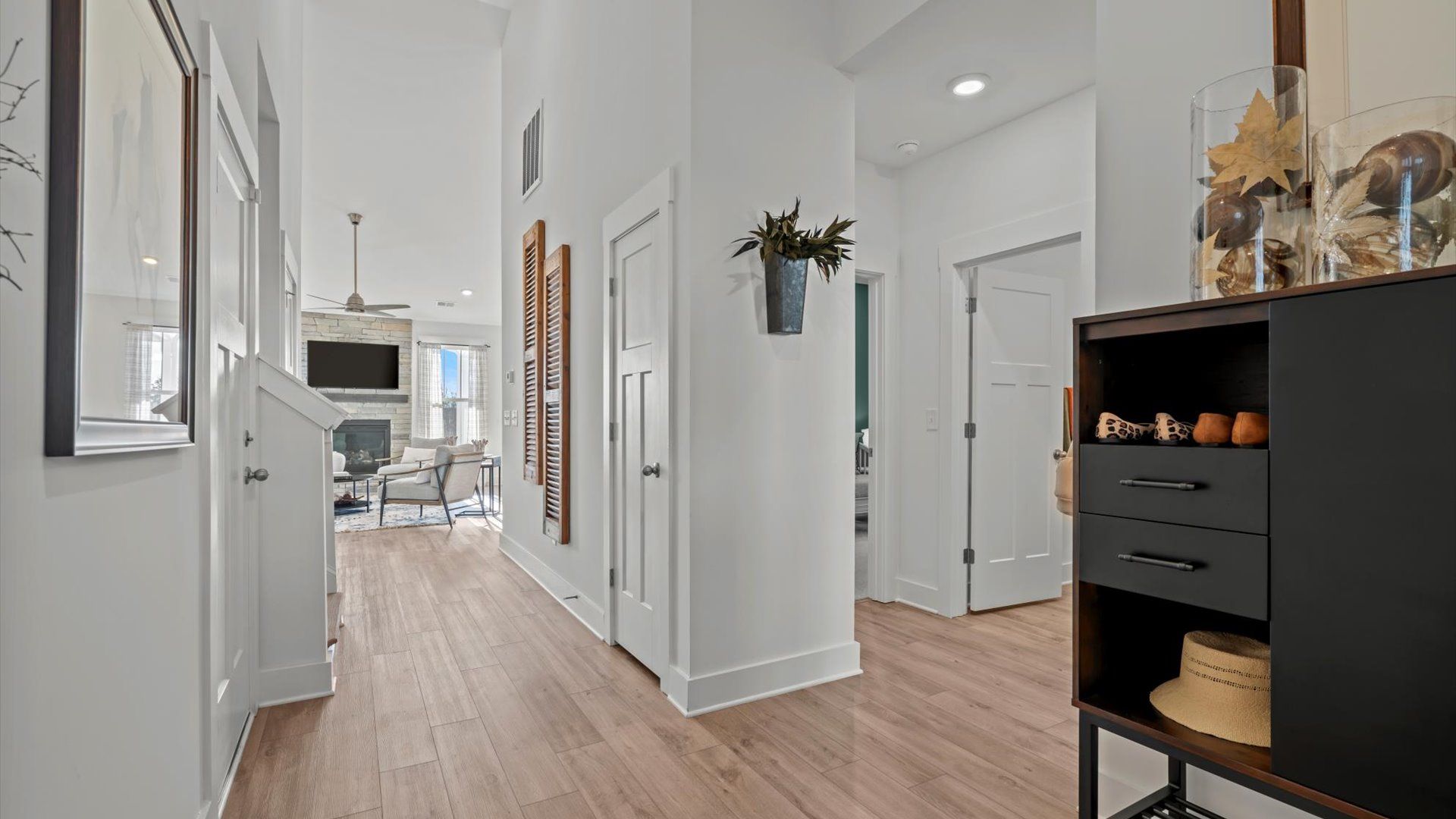 Stunning entryway with vaulted ceilings and hardwood flooring at Pelham Crossing by DRB Homes