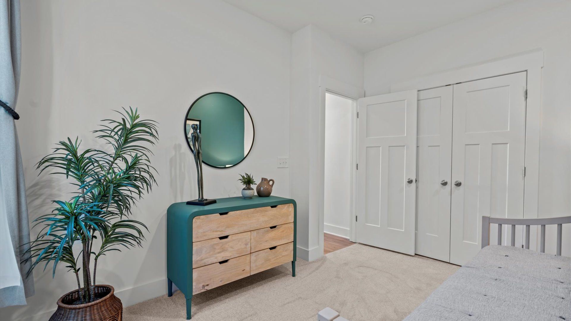 Pelham Crossing offers a plush carpeted secondary bedroom with large window by DRB Homes in Greenville, SC