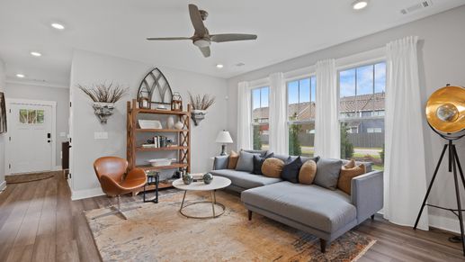 DRB Homes' Barton Hollow with spacious family room with large windows at Barton Hollow by DRB Homes in Fountain Inn, SC