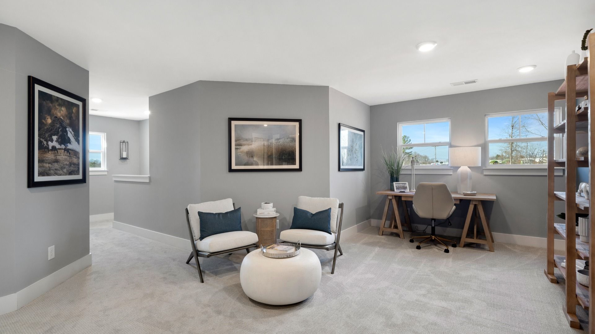 Cozy upstairs loft with plush carpet at Barton Hollow by DRB Homes in Fountain Inn, SC