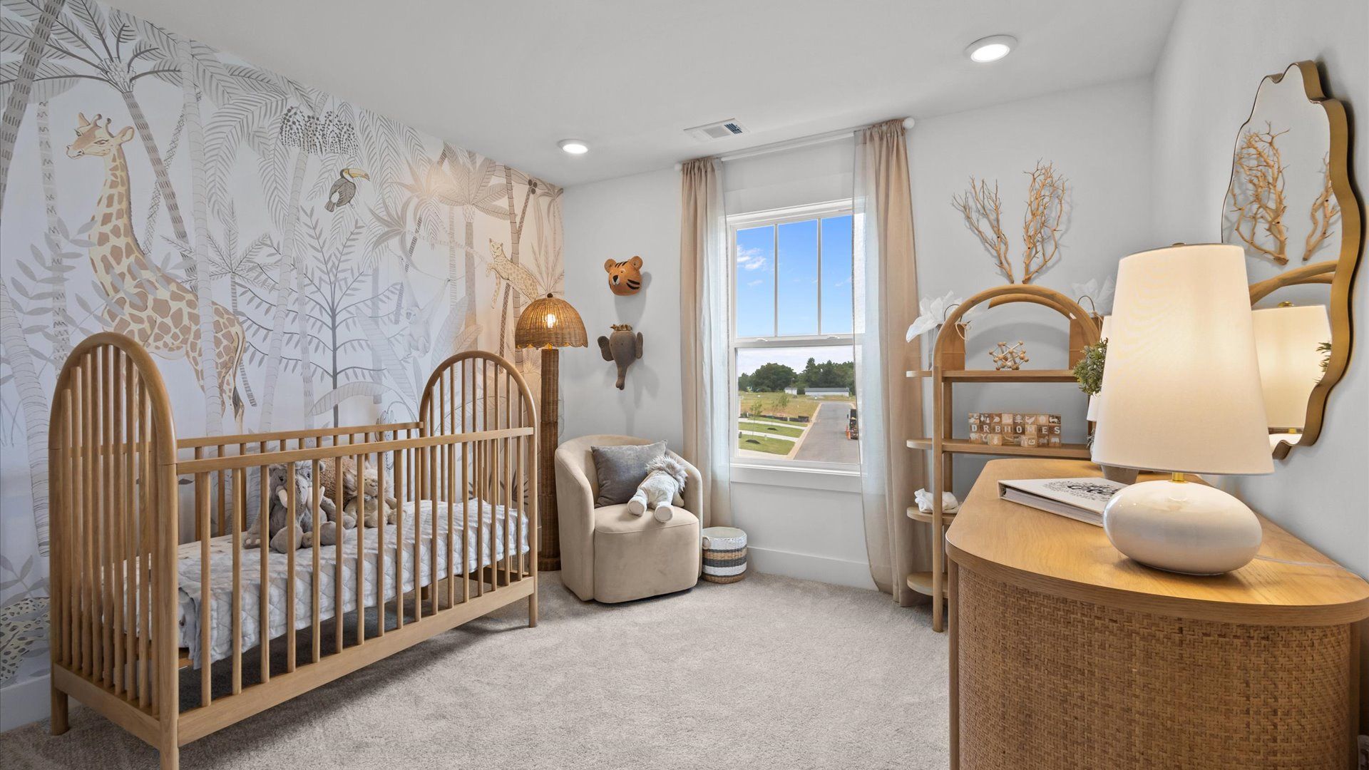 Tasteful secondary bedroom with plush carpet and a spacious walk-in closet