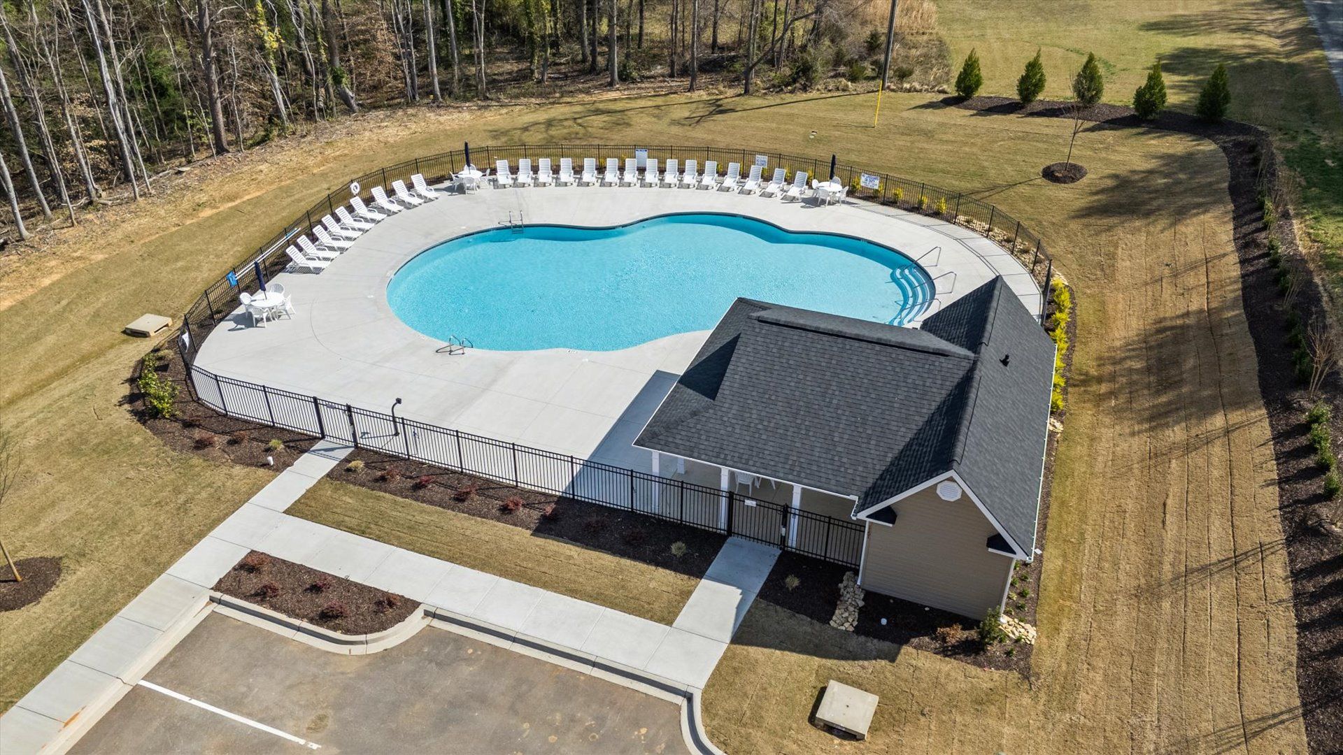 Amenity center at Iris Meadows by DRB Homes in Moore, SC consisting of Pool with Cabana