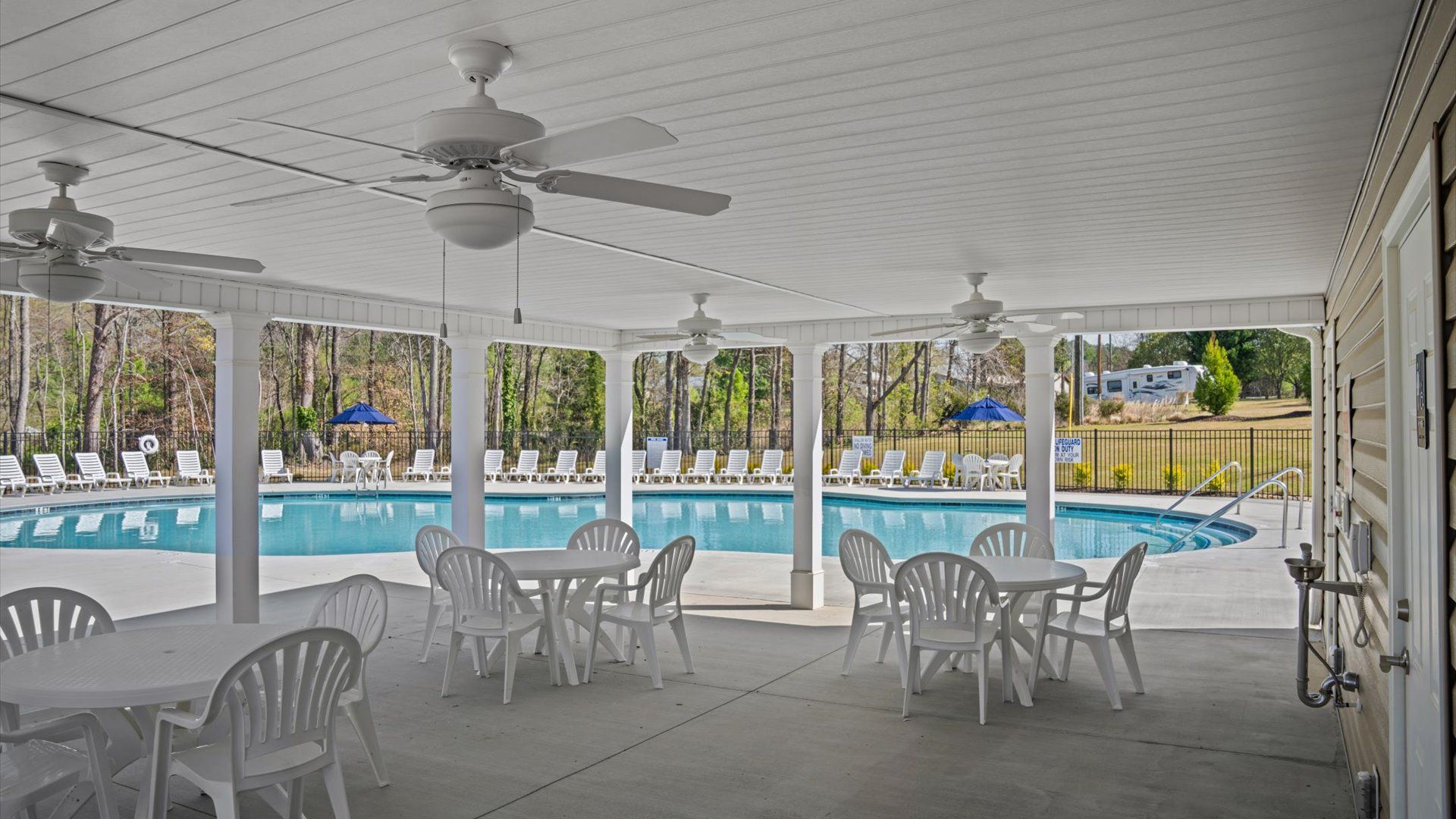 Amenity center at Iris Meadows by DRB Homes in Moore, SC consisting of Pool with Cabana