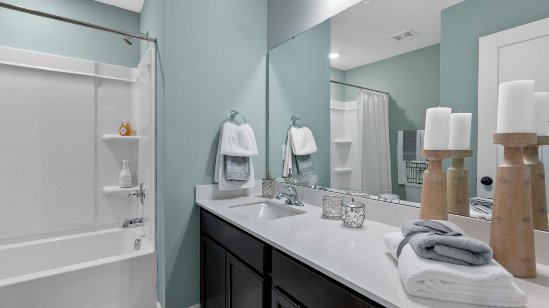 Secondary bathroom with granite countertops in two story townhome at Hickory Heights by DRB Homes in Downtown Greenville, SC