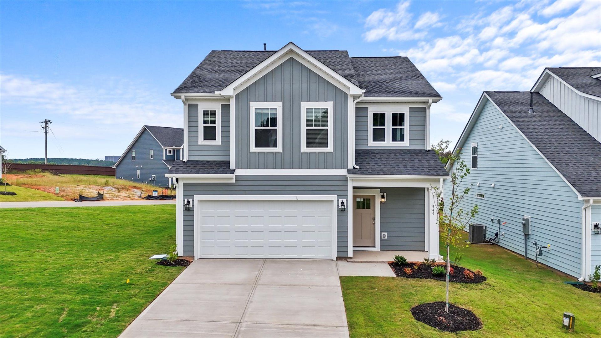 Exceptional home with tasteful exterior finishes and a thoughtfully designed façade in Woodruff, SC