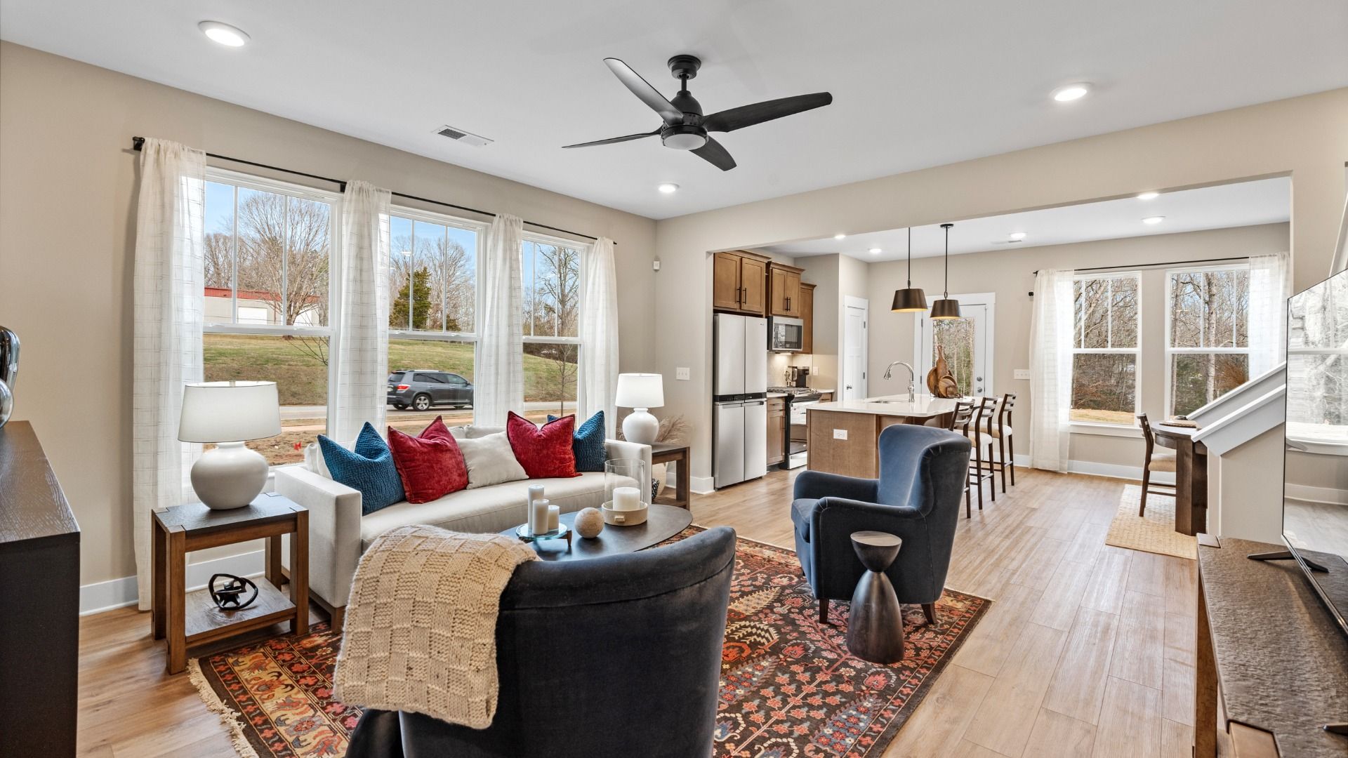 Colorfully decorated family room in two story townhome at Hickory Heights by DRB Homes near Downtown Greenville, SC