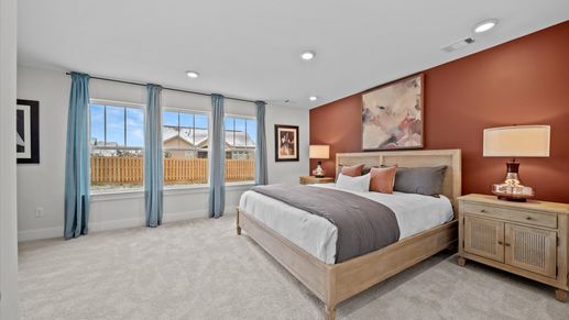 Cozy family room with elevated ceilings in two story townhome at Saluda Crossing by DRB Homes in Piedmont, SC